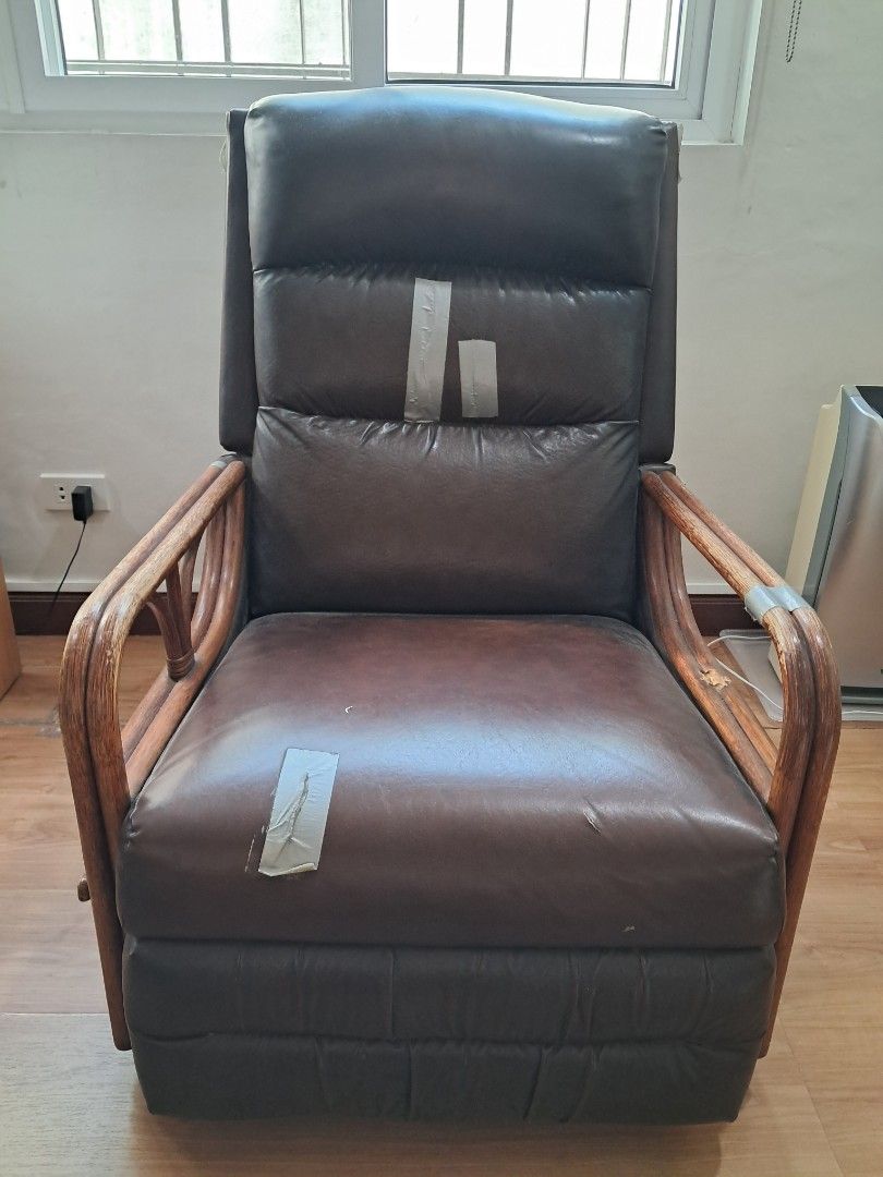 Lazyboy Recliner Chair (Category: Chairs) located in Quezon City. Submitted by konmare (Listing ID 1439609466, Image 1). Description: RFS: Decluttering - With ENGRAVED La Z Boy logo - Recliner chair with swivel - Wooden armrests - Reclining lever Pickup at QC.