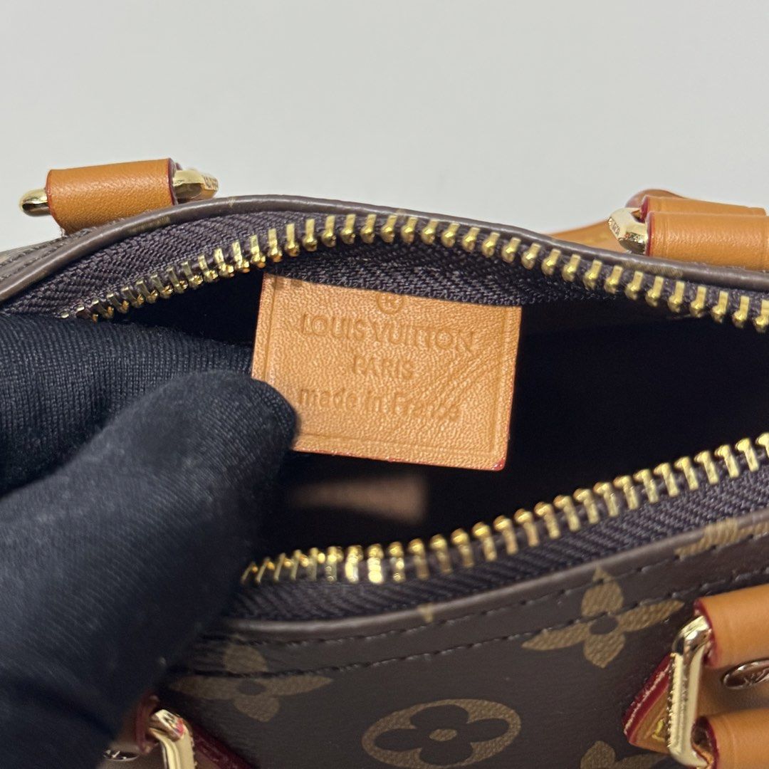 Louis Vuitton Mini Speedy Handbag (Category: Luxury Bags & Wallets) located in Dagupan City. Submitted by thriftygoods.dagupan (Listing ID 1439609375, Image 3). Description: - Authentic Louis Vuitton Mini Speedy handbag - Iconic monogram canvas - Brown leather handles - Gold-tone hardware - Top zipper closure - Detachable shoulder strap - Made in France - Brown interior lining - Compact size.