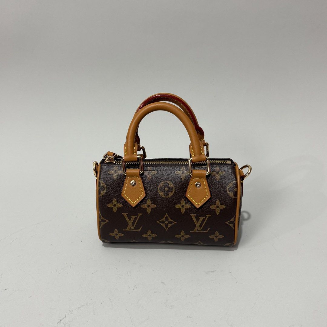Louis Vuitton Mini Speedy Handbag (Category: Luxury Bags & Wallets) located in Dagupan City. Submitted by thriftygoods.dagupan (Listing ID 1439609375, Image 1). Description: - Authentic Louis Vuitton Mini Speedy handbag - Iconic monogram canvas - Brown leather handles - Gold-tone hardware - Top zipper closure - Detachable shoulder strap - Made in France - Brown interior lining - Compact size.