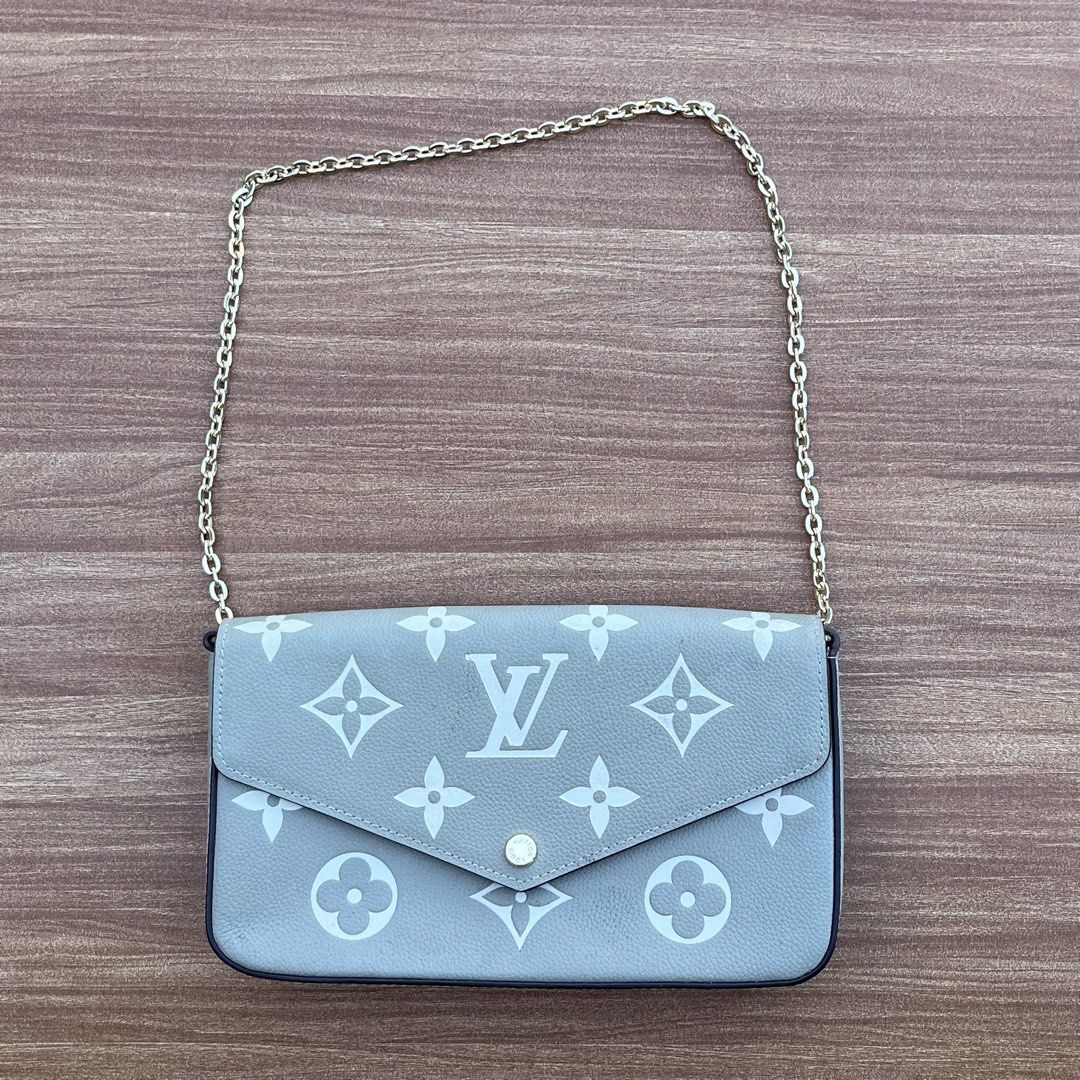 Louis Vuitton Multi Pochette Accessoires (Category: Luxury Bags & Wallets) located in Cavite. Submitted by pickednthrift64 (Listing ID 1439751853, Image 1). Description: - Louis Vuitton Multi Pochette Accessoires - Gray and white monogram design - Gold chain strap - Snap closure - Interior label: "LOUIS VUITTON PARIS made in France" - Date code: AR2200.