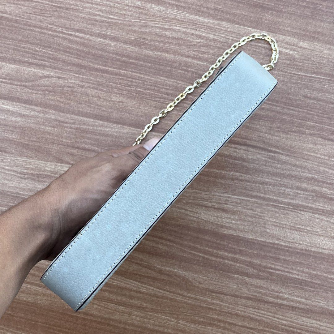 Louis Vuitton Multi Pochette Accessoires (Category: Luxury Bags & Wallets) located in Cavite. Submitted by pickednthrift64 (Listing ID 1439751853, Image 3). Description: - Louis Vuitton Multi Pochette Accessoires - Gray and white monogram design - Gold chain strap - Snap closure - Interior label: "LOUIS VUITTON PARIS made in France" - Date code: AR2200.