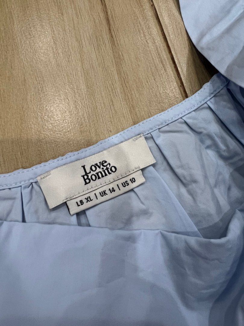 Love Bonito Daphne Tie Back Camisole (Category: Sleeveless) located in Zamboanga. Submitted by vrtlvrtl (Listing ID 1439702865, Image 2). Description: - Love, Bonito Daphne Tie Back Camisole - Color: Light Blue - Design: Square neckline, tie-back detail, peplum hem - Fit: Relaxed - Size: LB XL (UK 14, US 10) - Style: Casual and stylish.