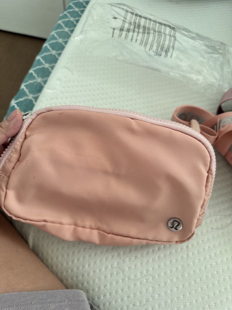 Lululemon Everywhere Belt Bag - Pink (Category: Cross-body Bags) located in Taguig. Submitted by pamraq (Listing ID 1439655596, Image 1). Description: - Lululemon Everywhere Belt Bag - Soft pink color - Main compartment with mesh pocket - Additional slip pocket - Zipper closure - Small Lululemon logo - Made in Vietnam.