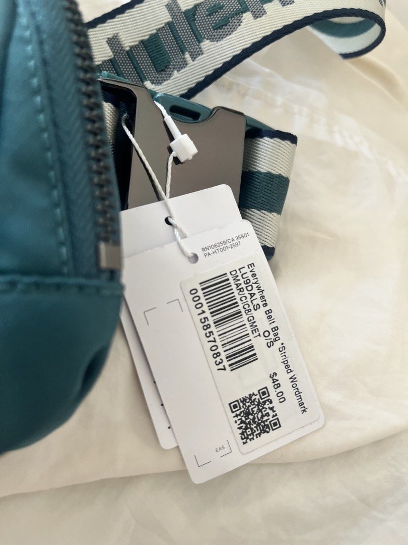 Lululemon Everywhere Belt Bag - Striped Wordmark (Category: Cross-body Bags) located in Quezon City. Submitted by classychicph92 (Listing ID 1439676734, Image 3). Description: - Authentic Lululemon Everywhere Belt Bag - Teal color - Striped wordmark strap - Zippered main compartment - Interior pocket - Metal buckle - Lululemon logo on front - Includes original tags.