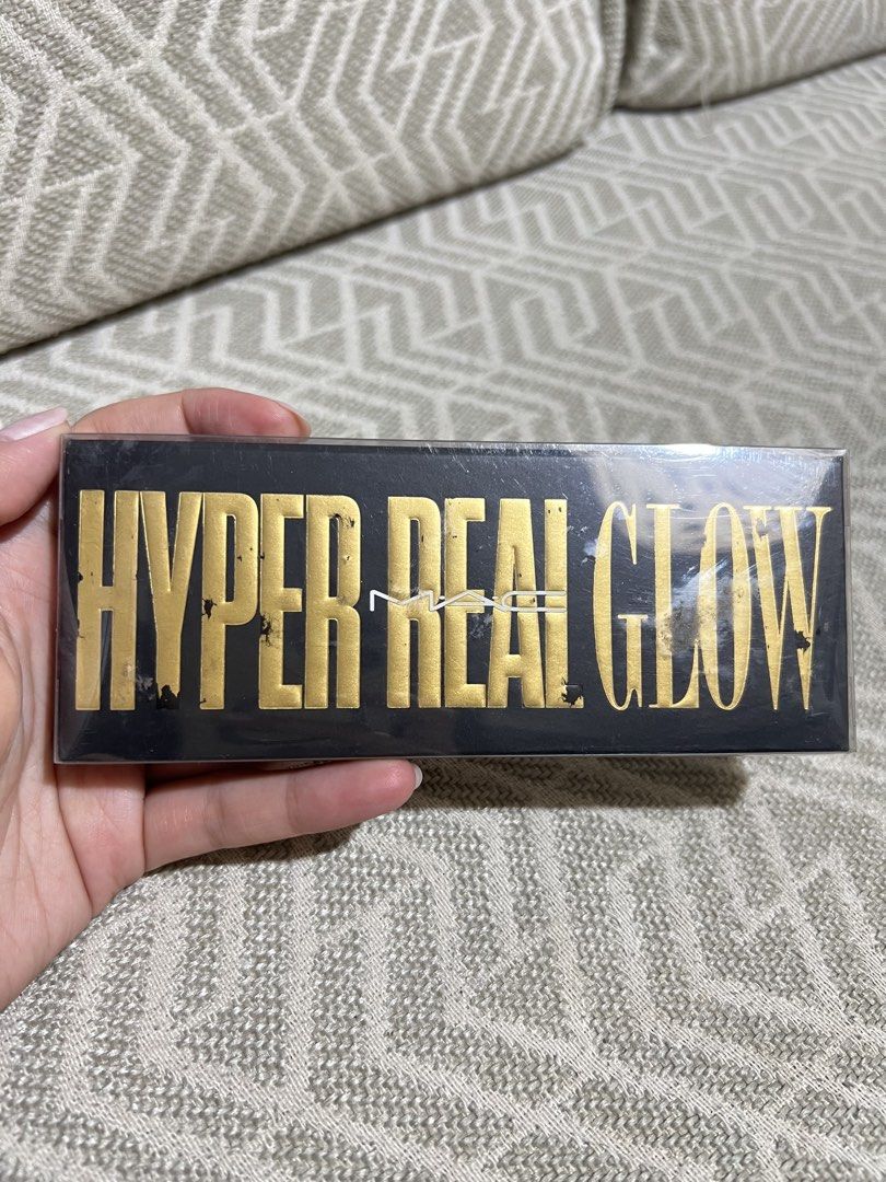 MAC Hyper Real Glow highlighting palette (Category: Makeup) located in Tagaytay City. Submitted by marielfradez (Listing ID 1439651021, Image 3). Description: MAC Hyper Real Glow highlighting palette in Get it Glowing, featuring three gold-toned shades designed for a luminous finish. From US Never been used Flaws: dent sa isang highlighter from opening.