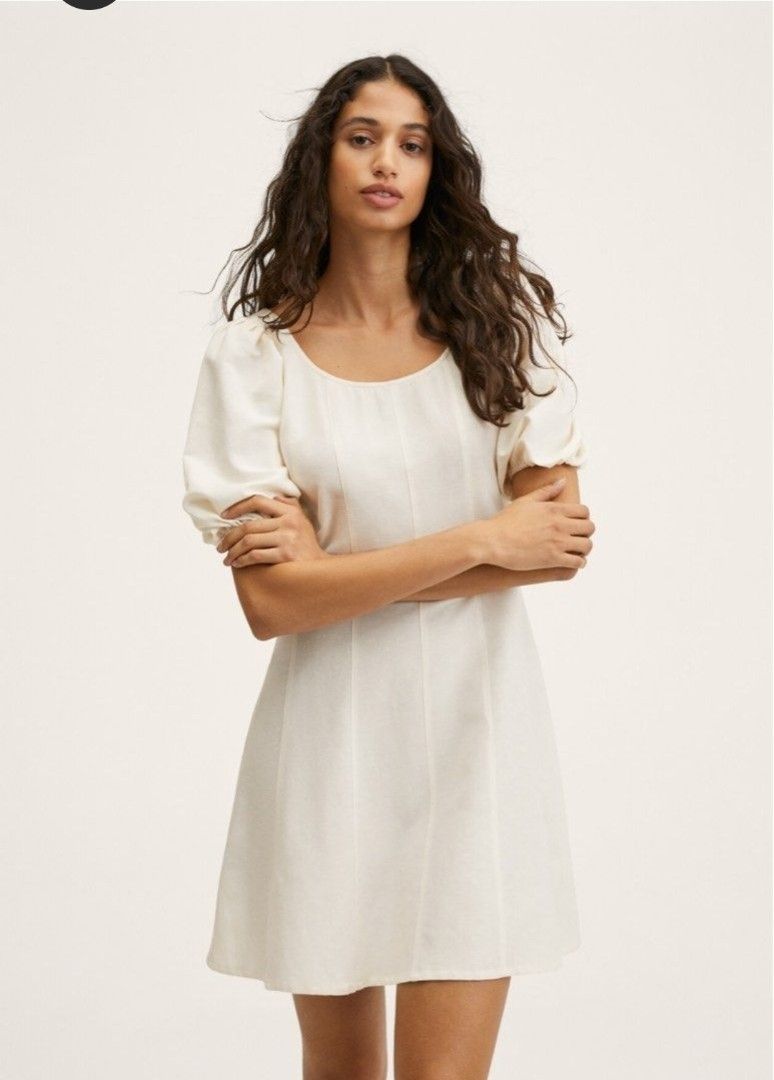 Mango White Mini Dress (Category: Sleeveless) located in Manila. Submitted by steffi.declutters (Listing ID 1436054283, Image 1). Description: - Mango white top - Size: L - Features: Short sleeves, scoop neck - Color: White - Fabric: Lightweight - Made in India.