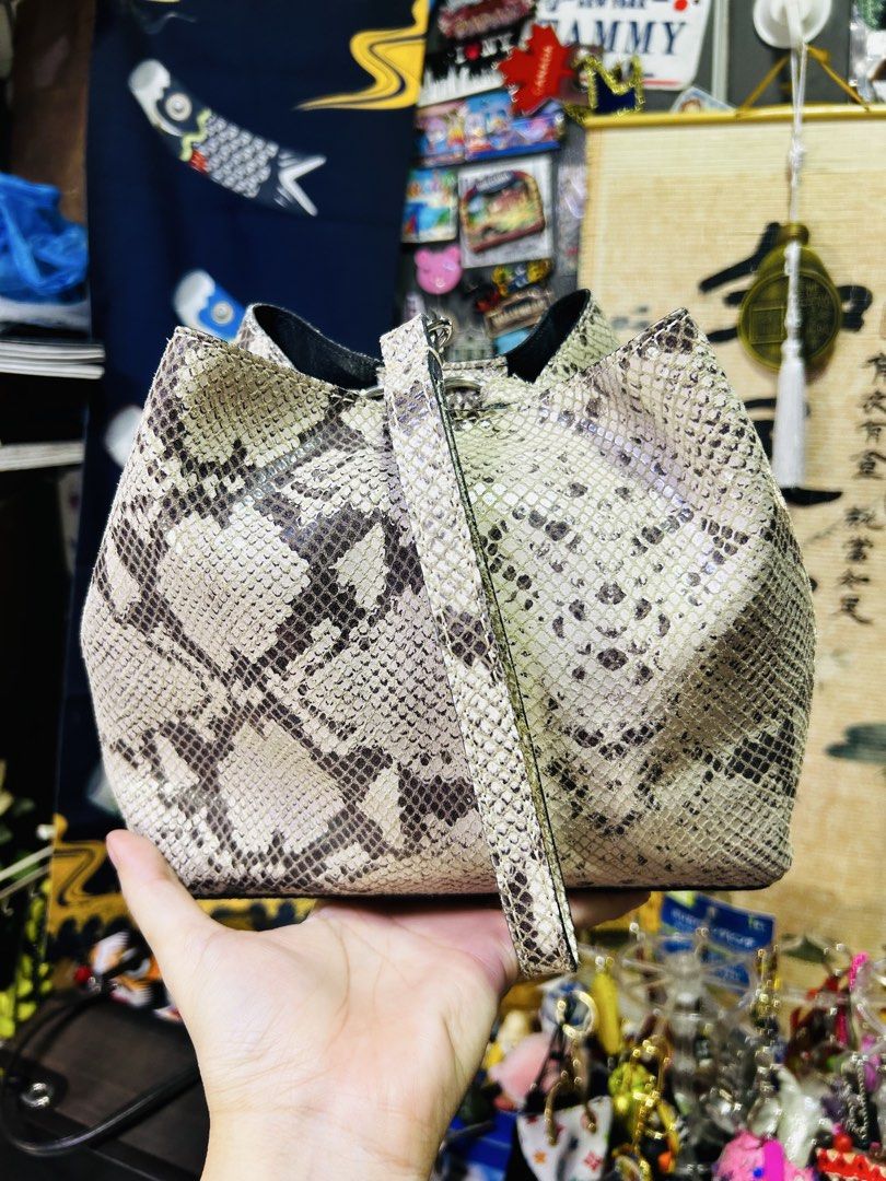 Marco Bianchini Snakeskin Bucket Bag (Category: Community) located in Manila. Submitted by starbalesukandjapansurplus (Listing ID 1439621877, Image 3). Description: - Snakeskin pattern bucket bag - Top handle and detachable shoulder strap - Drawstring closure - Interior: Black - Color: Neutral beige and brown.
