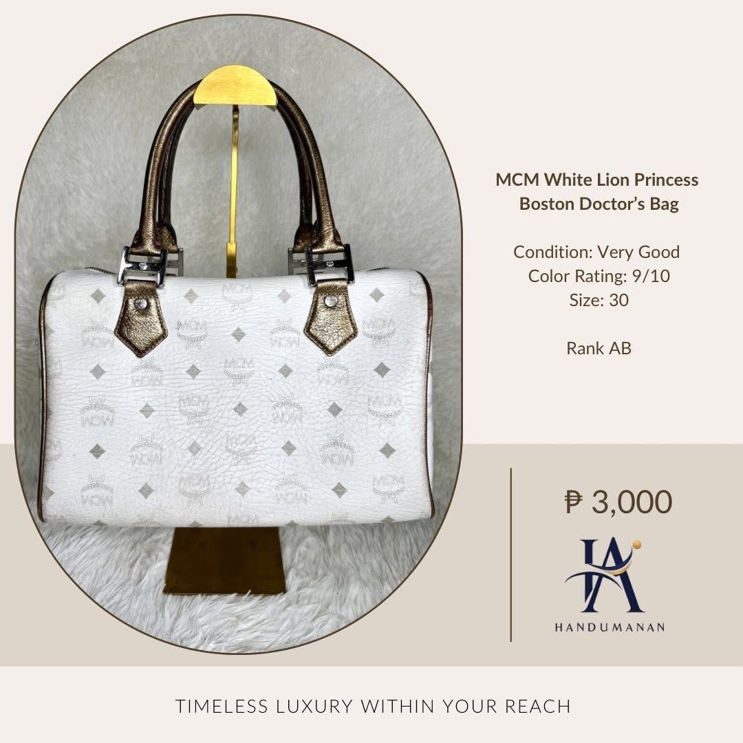 MCM White Lion Princess Boston Bag (Category: Luxury Bags & Wallets) located in Sibalom. Submitted by glaizabinas (Listing ID 1439700893, Image 2). Description: MCM White Lion Princess Boston Doctor's Bag Condition: Very Good Color Rating: 9/10 Size: 30.