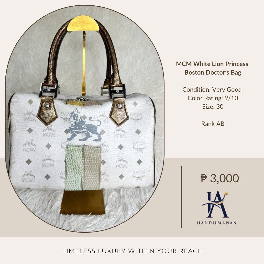 MCM White Lion Princess Boston Bag (Category: Luxury Bags & Wallets) located in Sibalom. Submitted by glaizabinas (Listing ID 1439700893, Image 1). Description: MCM White Lion Princess Boston Doctor's Bag Condition: Very Good Color Rating: 9/10 Size: 30.