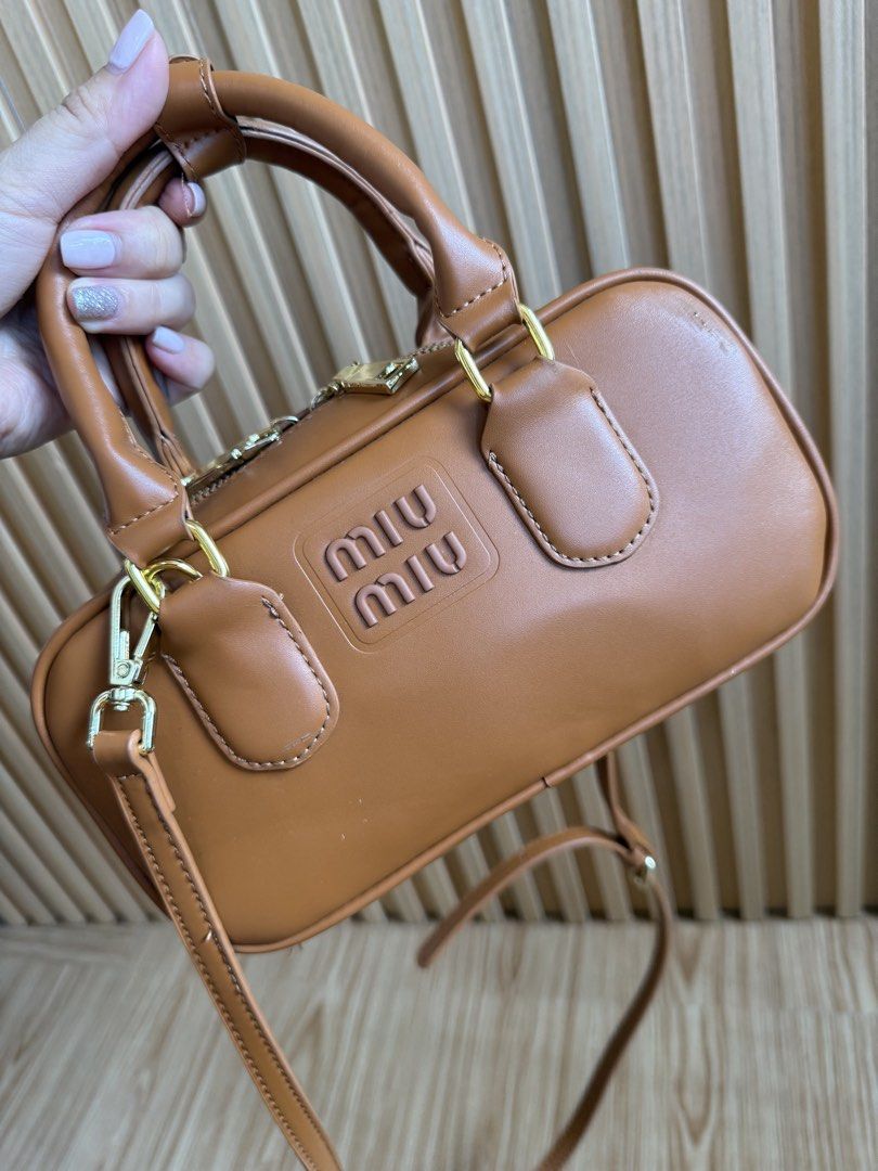miumiu (Category: Luxury Bags & Wallets) located in Lipa City. Submitted by thyra06 (Listing ID 1439752952, Image 3). Description: miumiu two way good as new.