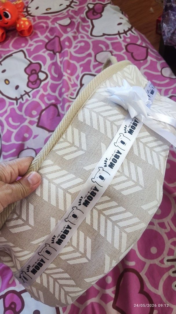 Moby Baby Basket (Category: Other Babies Going Out Needs) located in Manila. Submitted by ruane_raleigh12 (Listing ID 1439671051, Image 2). Description: - Moby baby basket - Neutral color scheme - Decorative ribbon - Chevron pattern exterior - Soft interior lining - Sturdy handles - Unused condition.