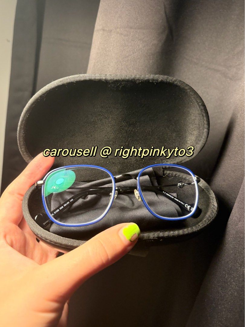 Moncler Eyeglasses with Blue Accents (Category: Sunglasses & Eyewear) located in Davao. Submitted by rightpinkyto3 (Listing ID 1439781514, Image 3). Description: Bought them for almost 14k - Stylish Moncler eyeglasses - Sleek design with blue accents - Includes original case and paperwork - Modern square frame - Perfect for everyday wear or special occasions.