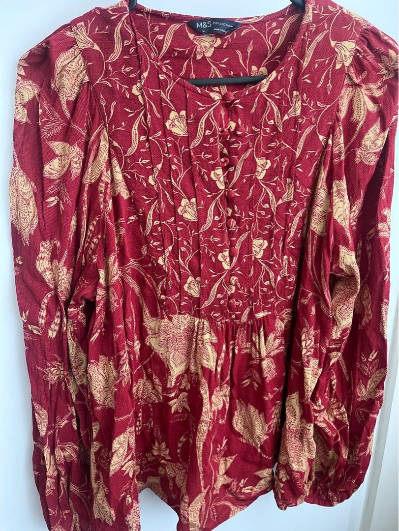 M&S Collection Floral Blouse (Category: Blouses) located in Makati City. Submitted by loveeph (Listing ID 1439630462, Image 1). Description: - M&S Collection blouse - Beautiful floral print in burgundy and gold, pintuck design, boho-style - Size: 14 - Features long sleeves - Round neckline with pleat detailing and buttons - Made in India No damage /issues Bought in Glorietta Makati branch RFS: Decluttering Mode of payment: Gcash or BPI transfer S