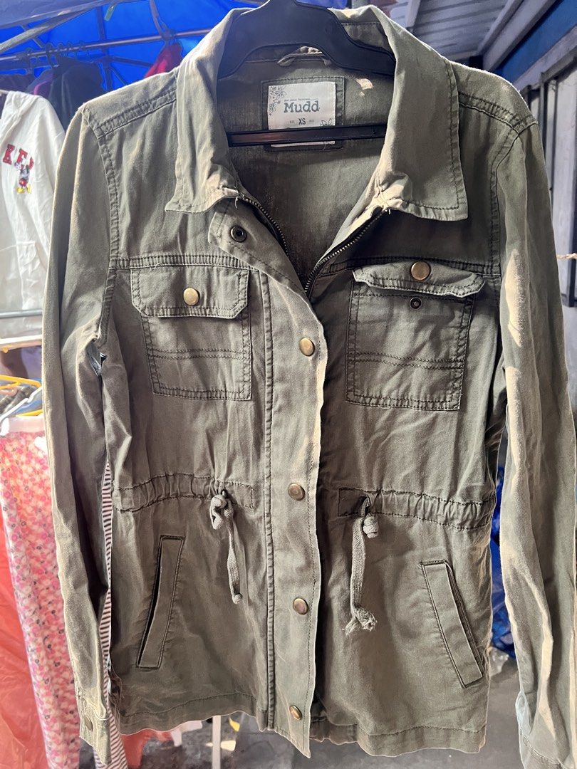 Mudd XS Green Jacket (Category: Coats, Jackets and Outerwear) located in Malabon City. Submitted by arsher25 (Listing ID 1439617430, Image 2). Description: - Mudd green jacket - Size: XS - Features: - Collared neckline - Button and zipper closure - Two front pockets - Drawstring waist - Buttoned cuffs.