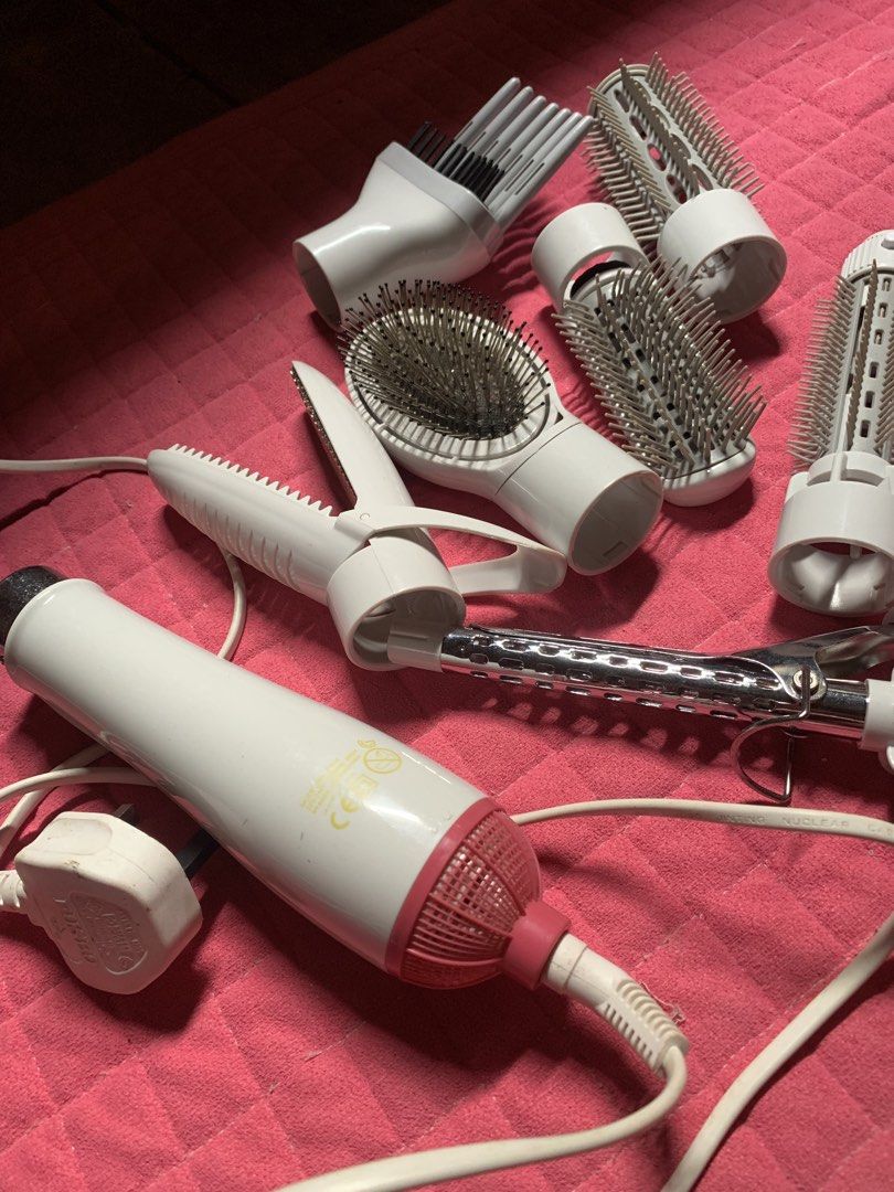 Multi-Functional Hair Styler with Attachments (Category: Hair) located in Gandara. Submitted by archivefits.ph (Listing ID 1439624354, Image 1). Description: ✨ FOR SALE: Multi-Styler Hair Dryer Set ✨ 💖 Complete attachments included 💖 Perfect for blow dry, curls, volume & styling 💖 Still in good condition 💖 Cute pink and white design 💖 Easy to use and convenient for everyday styling 📌 Includes: • Curling attachment • Round brushes • Paddle b