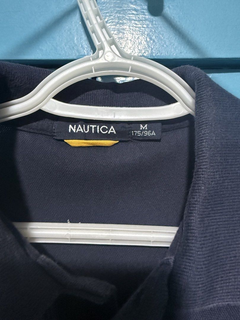 Nautica Striped Polo Shirt - Medium (Category: Tshirts & Polo Shirts ) located in Las Pinas. Submitted by voilecabrera (Listing ID 1439746096, Image 2). Description: - Navy blue Nautica polo shirt - Vertical stripes design - Classic polo collar - Short sleeves - Features the Nautica logo - Size: Medium (M) Location: Pioneer st Mandaluyong or Makati (tuesday to friday) Las pinas (saturday to monday).