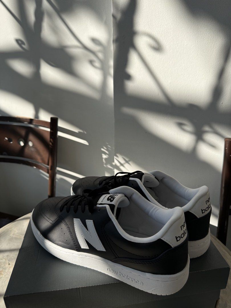 New Balance Black Sneakers BNEW (Category: Sneakers) located in Mandaluyong City. Submitted by lancesilayan (Listing ID 1439614487, Image 2). Description: New Balance 288S sneakers in black. Features a white midsole and the iconic New Balance logo on the side. The shoes come with their original box. The laces are black and the overall design is sleek and modern..