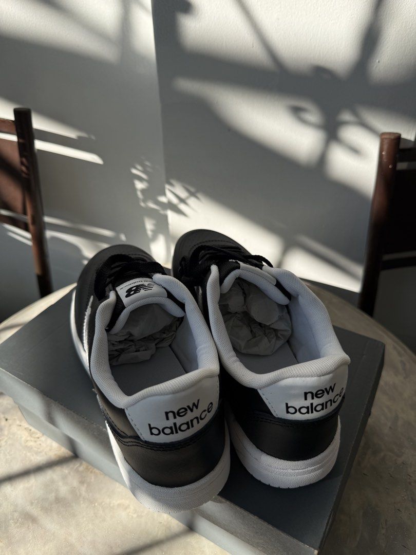 New Balance Black Sneakers BNEW (Category: Sneakers) located in Mandaluyong City. Submitted by lancesilayan (Listing ID 1439614487, Image 3). Description: New Balance 288S sneakers in black. Features a white midsole and the iconic New Balance logo on the side. The shoes come with their original box. The laces are black and the overall design is sleek and modern..