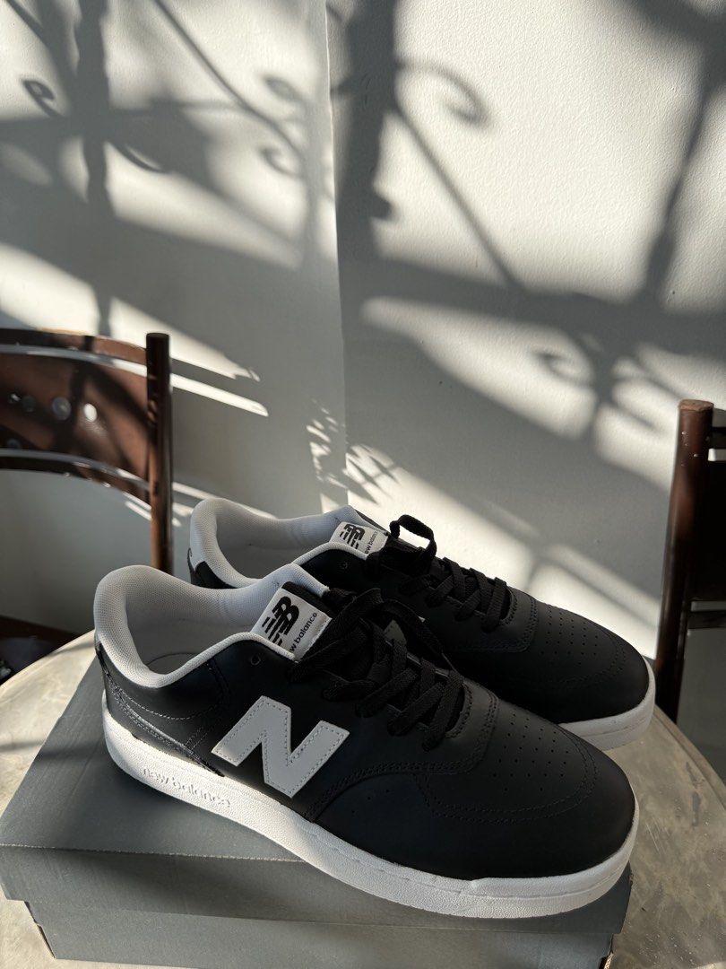 New Balance Black Sneakers BNEW (Category: Sneakers) located in Mandaluyong City. Submitted by lancesilayan (Listing ID 1439614487, Image 1). Description: New Balance 288S sneakers in black. Features a white midsole and the iconic New Balance logo on the side. The shoes come with their original box. The laces are black and the overall design is sleek and modern..