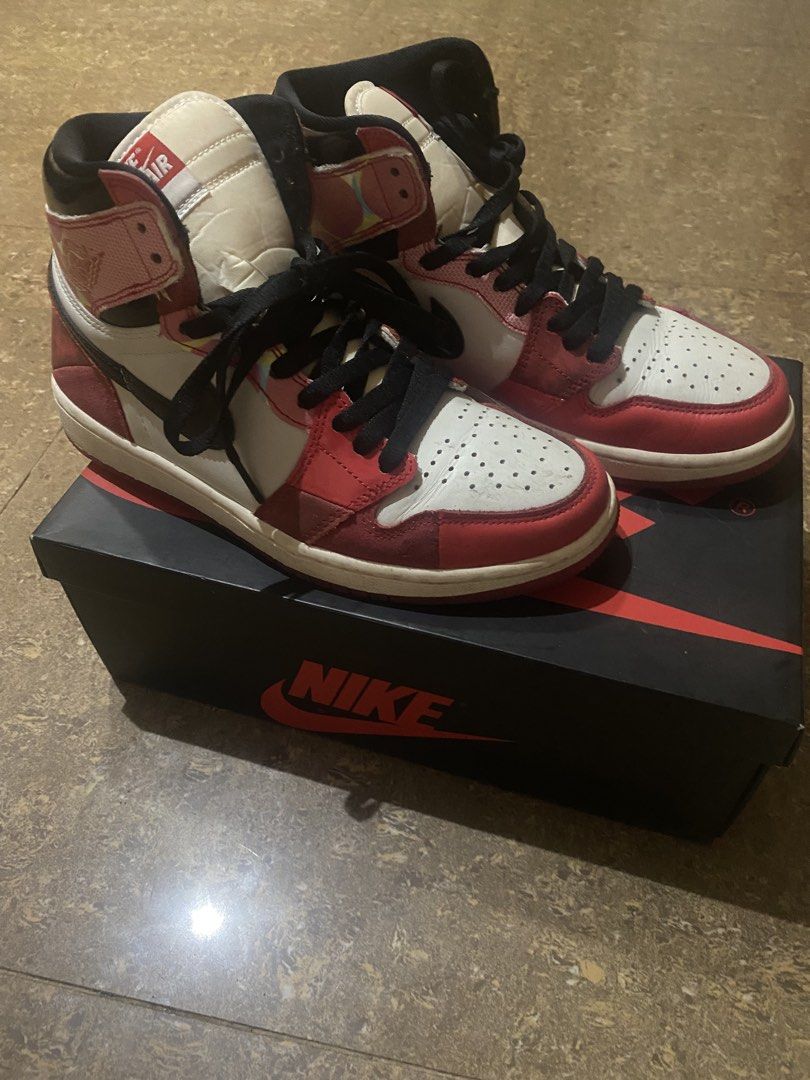 Nike Air Jordan 1 High OG (Category: Sneakers) located in Binan City. Submitted by maggierabi01434 (Listing ID 1439644435, Image 2). Description: - Nike Air Jordan 1 High OG sneakers - Color: Red, white, and black - High-top design - Size: US 7 - Features the classic Nike swoosh - Comes with the original box - Black laces and red/white sole.