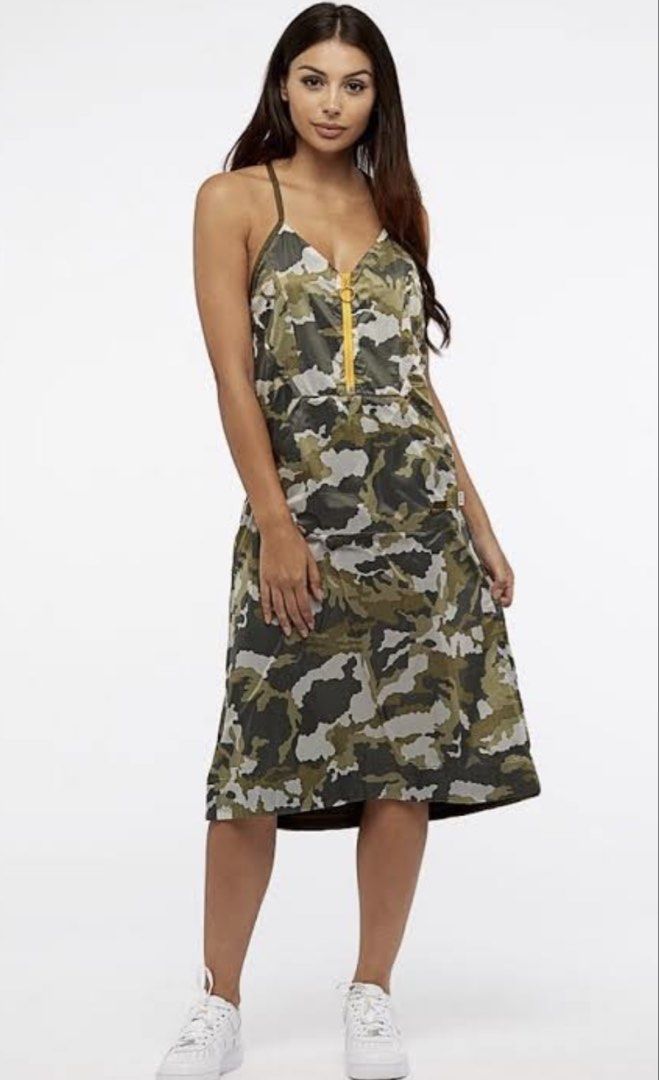 Nike Camouflage Dress (Category: Dresses) located in Makati City. Submitted by joycesp (Listing ID 1439613459, Image 1). Description: - Nike midi dress - Unique camouflage pattern - Yellow zipper - Spaghetti straps - Size: Small .