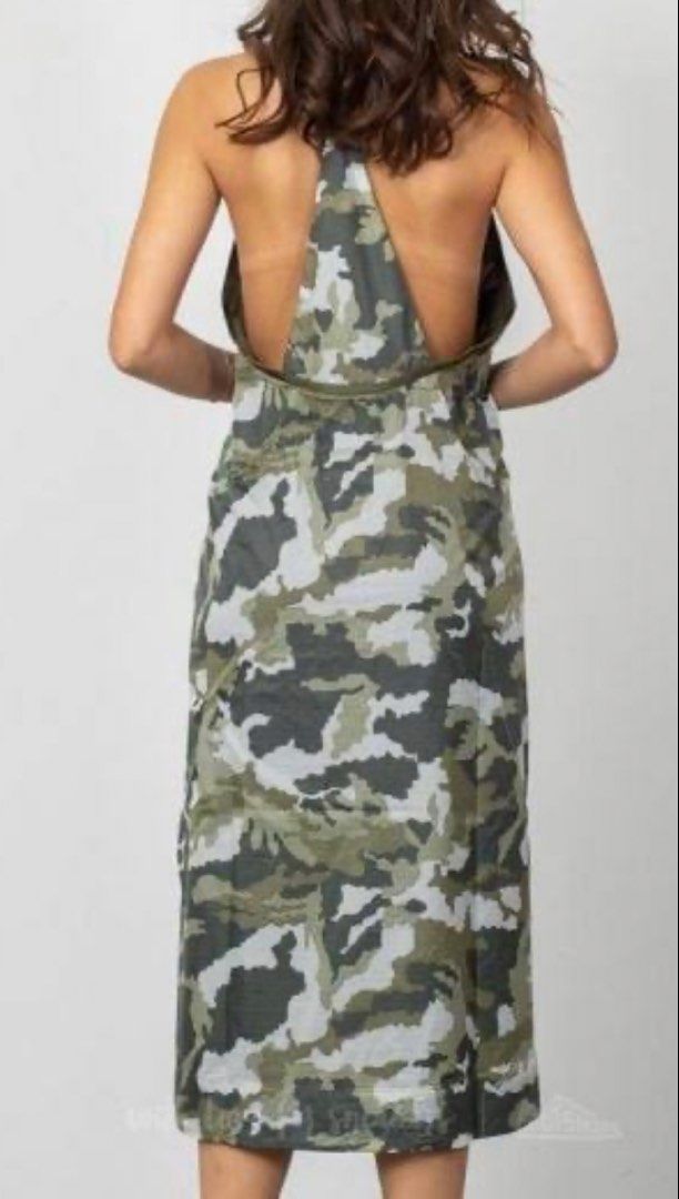 Nike Camouflage Dress (Category: Dresses) located in Makati City. Submitted by joycesp (Listing ID 1439613459, Image 2). Description: - Nike midi dress - Unique camouflage pattern - Yellow zipper - Spaghetti straps - Size: Small .