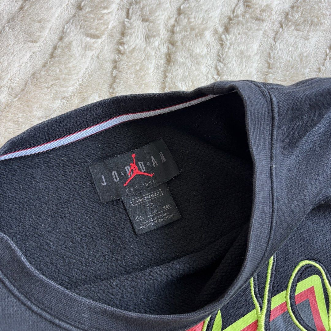 Nike Jordan 23 Crewneck Sweatshirt (Category: Coats, Jackets and Outerwear) located in Quezon City. Submitted by grailph (Listing ID 1439637651, Image 3). Description: - Black Nike Jordan crewneck sweatshirt - Features the number 23 and a signature design on the front - Jordan logo on the sleeve and tag - Made of 80% cotton and 20% polyester - Size: XXL - Dimensions 25”x27” Color rate 7.5/10.