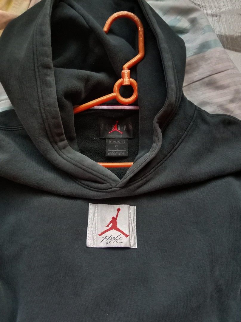 Nike Jordan Flight Hoodie (Category: Coats, Jackets and Outerwear) located in Manila. Submitted by peeweemend69204 (Listing ID 1439608183, Image 3). Description: - Nike Jordan Flight hoodie - Features Flight logo on front and back - Includes Nike logo and "Flight" on the back - Has a front pocket - Comes with a hood - Tag visible in images.