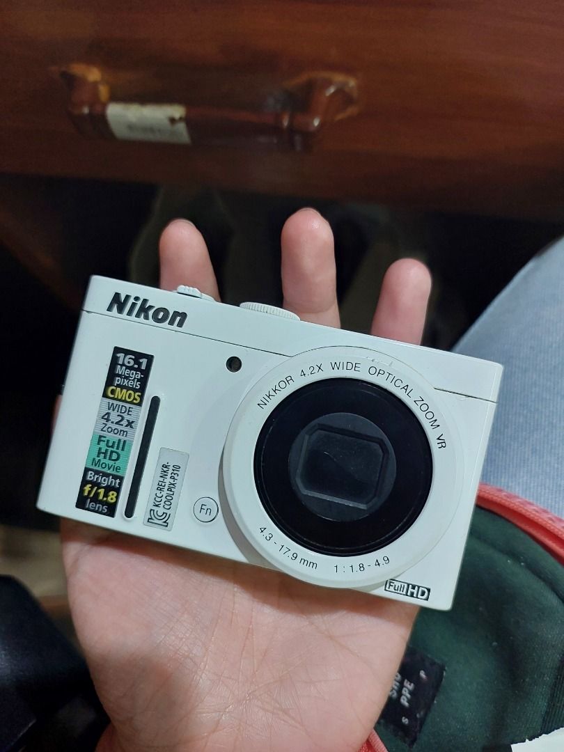 STILL AVAILABLE! Nikon Coolpix P310 (Category: Cameras) located in Baybay. Submitted by joanpatz (Listing ID 1439801335, Image 1). Description: - Nikon COOLPIX P310 - 16.1 megapixels - 4.2x wide optical zoom - Full HD movie recording -has manual mode - Bright f/1.8 lens - flash working - Color: White ISSUES! -has overexposure issues (pls see sample pics) - minor vignette - laggy (bc I don't really use it) but functional zoom INCLUSIONS: wrist str