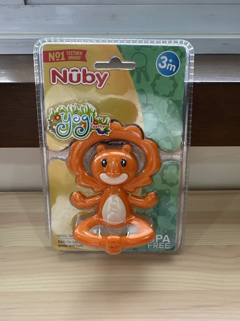 Nuby Yogi Teether (Category: Soothers & Pacifiers) located in Quezon City. Submitted by things2things (Listing ID 1439693847, Image 1). Description: - Nuby Yogi Teether for babies 3 months and up. - Features fun designs and colors. - Easy for baby to grip and hold. - Made of 100% silicone. - PA free. - Shaped like a cute orange animal..