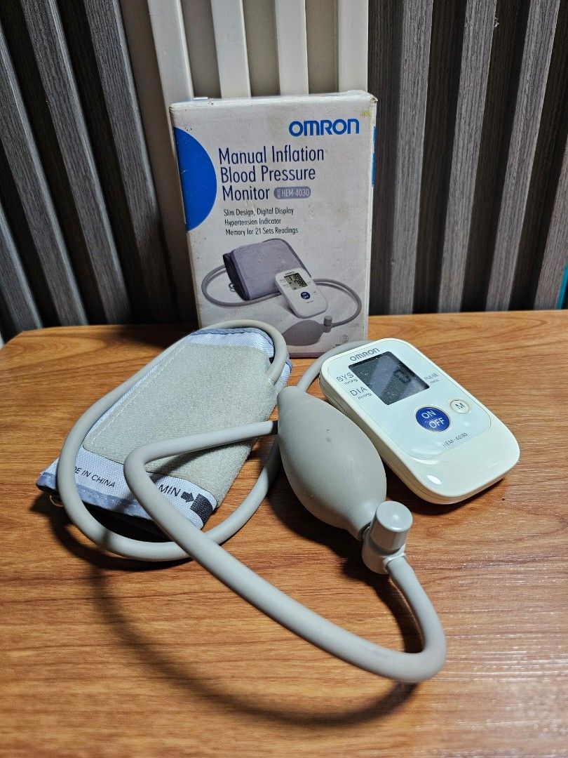 Omron Manual Inflation Blood Pressure Monitor HEM-4030 (Category: Health Monitors & Weighing Scales) located in Manila. Submitted by mamaloverakkie (Listing ID 1439680476, Image 1). Description: ISSUE: Nagbleed po yung sa LCD nya po pero makikita pa din naman po yung result po batt operated po siya 2pcs. AAA - Omron HEM-4030 Blood Pressure Monitor - Includes monitor, cuff, and inflation bulb - Features an LCD screen - Displays systolic and diasto