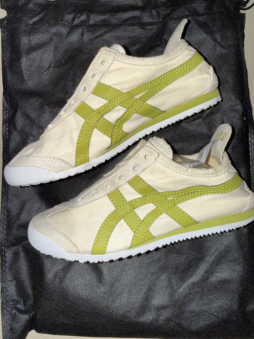 Onitsuka Slip-On Cream Green (Category: Sneakers) located in Cavite. Submitted by thriftaholic.shopp (Listing ID 1439688175, Image 2). Description: Preloved Onitsuka Slip On Sneaker Cream/Green Colorway Canvas and Suede Flaws : Has some dirt. Size : EU 36 / 22.5CM / US4.