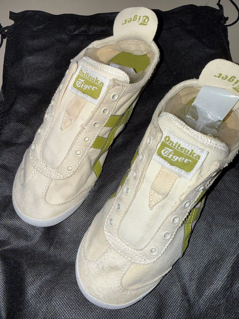 Onitsuka Slip-On Cream Green (Category: Sneakers) located in Cavite. Submitted by thriftaholic.shopp (Listing ID 1439688175, Image 1). Description: Preloved Onitsuka Slip On Sneaker Cream/Green Colorway Canvas and Suede Flaws : Has some dirt. Size : EU 36 / 22.5CM / US4.