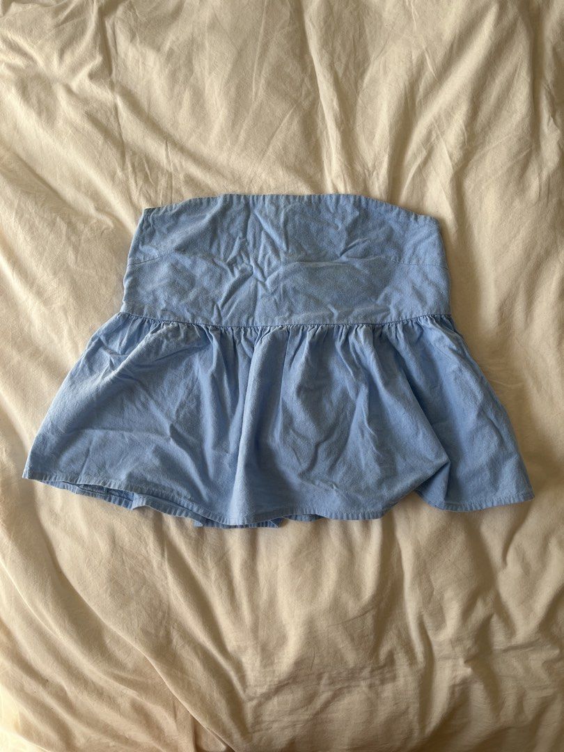 Pastel Blue Tube Top (Category: Sleeveless) located in Bacoor. Submitted by talasells (Listing ID 1439610146, Image 1). Description: - Light blue tube top - Ruffled hem - Strapless design - Light fabric - Perfect for warm weather - Solid color.