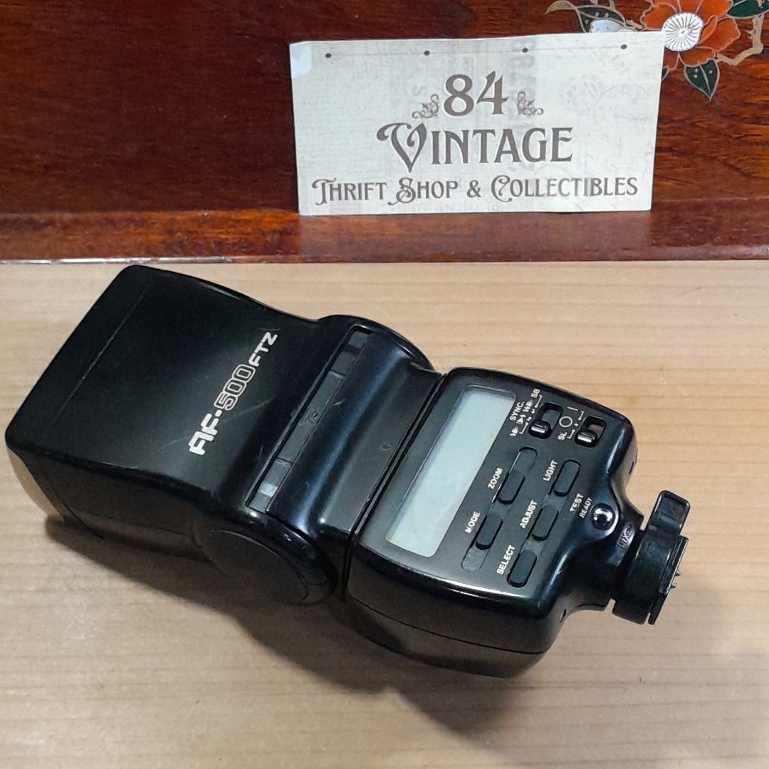 Pentax AF-500 FTZ (Category: Flashes) located in Las Pinas. Submitted by 84vintage (Listing ID 1439761841, Image 2). Description: Actual photos posted. Please examine them carefully as they are part of the description. --📌 MUST READ Before Dealing with us 📌-- ⚠️Price is posted. No lowballs please. ⚠️Vintage items are only sold As Is Where Is. If you want new items without any flaws, you can buy at the mall. Please manage your expectations. ⚠️Pi