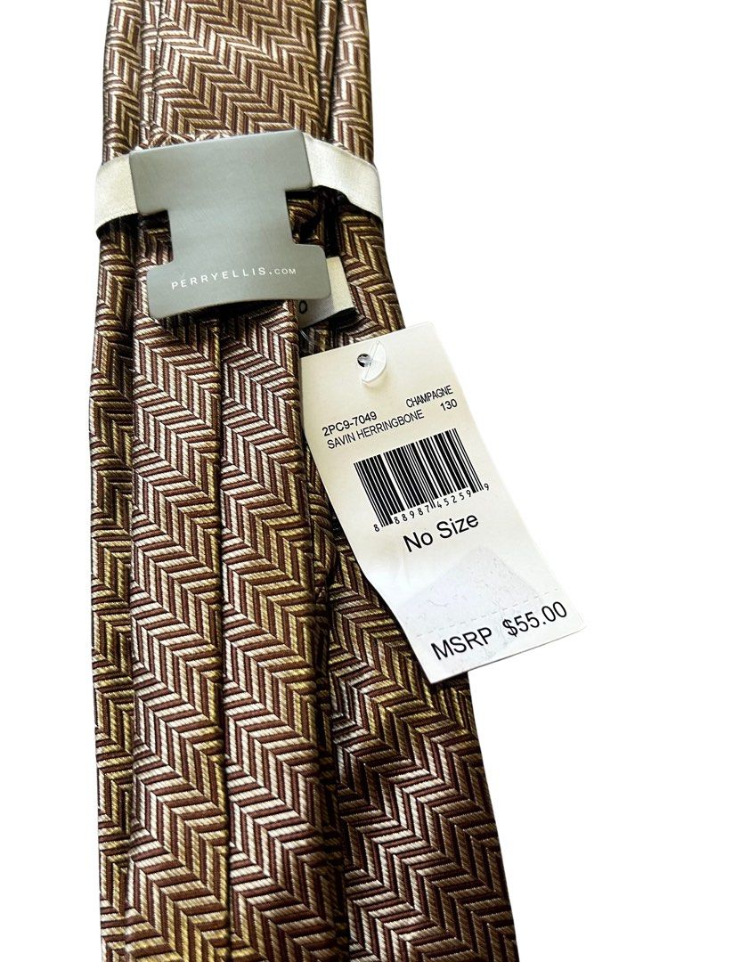 Perry Ellis Champagne Savh Herringbone Tie (Category: Ties) located in Imus. Submitted by swiftfire_39c538 (Listing ID 1439804545, Image 2). Description: - Brand new Perry Ellis tie - Color: Champagne - Pattern: Savh Herringbone - Model number: 2PC9-T049 - Retail price: $55.00 - Ideal for formal occasions.