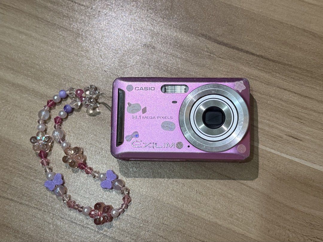 Pink Casio Exilim EX-Z9 🍀📸 (Category: Cameras) located in Manila. Submitted by xiaolongmallow (Listing ID 1439648045, Image 3). Description: 🔅 8.1 megapixels 🔅 built-in flash 🔅 pre-loved compact digicam ! issues: 🔅 only bottom button is working (flash settings button) (does not affect ability to take pictures) 🔅 lcd burn (does not affect output) 🔅 broken battery cover, but battery lock is still working (does not affect output) inclusions: