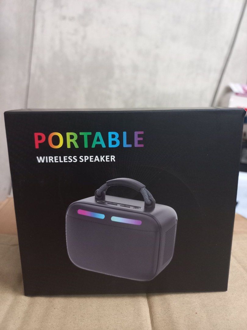 Portable Wireless Speaker with LED Lights (Category: Soundbars, Speakers & Amplifiers) located in Manila. Submitted by lesliejoy80219 (Listing ID 1439635681, Image 2). Description: - Brand new portable wireless speaker - Sleek black design - Features colorful LED lights - Includes a handle for easy carrying - Comes in original packaging - Box clearly marked "PORTABLE WIRELESS SPEAKER".