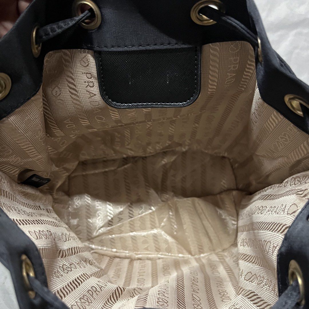 PRADA (Category: Luxury Bags & Wallets) located in Las Pinas. Submitted by unknownthfrift99 (Listing ID 1439754712, Image 3). Description: FOR SALE PRADA DRAWSTRING NYLON BAG GOOD AS NEW ISSUE TANGGAL LANG METAL TAG SA LOOB 850 SHIPP LAS PIÑAS LOC .