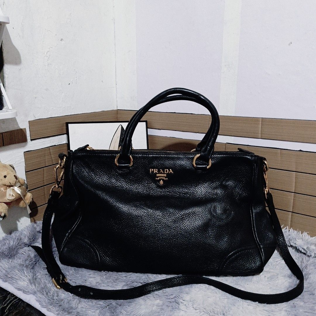 PRADA MILANO BLACK LEATHER 2WAY BAG (Category: Shoulder Bags) located in Manila. Submitted by mom.0f.2 (Listing ID 1439780354, Image 1). Description: Pls. see pics for details.. PRELOVED BUT WELL LOVED. Pls. manage your expeactation since this is not brandnew. All details are posted, pls check .. ITEM IS ON HAND AND READY TO SHIP ONCE SETTLED. NO COD,G- CASH PAYMENT ONLY. COD SHIPPING FEE. IF IFNTERESTED, KINDLY DROP A MESSAGE. TYSMMMMM & GODBLES