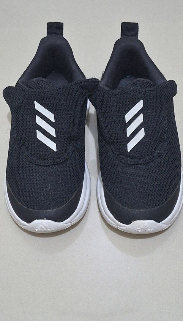 Preloved Adidas Fortarun Shoes (Category: Babies & Kids Fashion) located in Los Banos. Submitted by mckecollection (Listing ID 1439696795, Image 1). Description: -preloved item po ito - Adidas Fortarun shoes - US size 9K - CHN 150, Insole: 16.5cm - Black mesh upper with white stripes - White sole - Velcro closure - best fit for toddler age,check mo nlang size ng paa ng magsusuot PHP600.