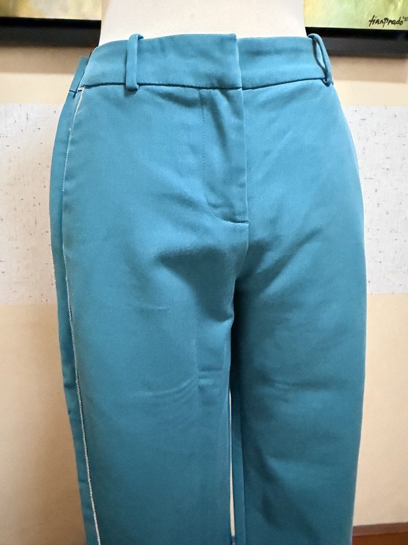 Promod Cotton Trousers (Category: Other Bottoms) located in Muntinlupa City. Submitted by gap0710 (Listing ID 1439686832, Image 2). Description: Promod pants with silver decorative lining on both sides. In very good condition. .
