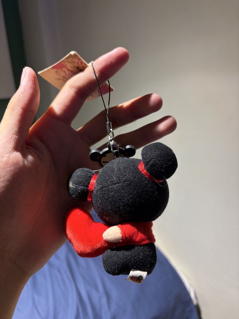 Pucca Plush Keychain (Category: Plushies & Soft Toys) located in Makati City. Submitted by squishycorner (Listing ID 1439768385, Image 2). Description: - Adorable Pucca plush keychain - Features Pucca in her signature red outfit - Holding a red heart - Includes the original tag - Perfect for fans or as a cute accessory.