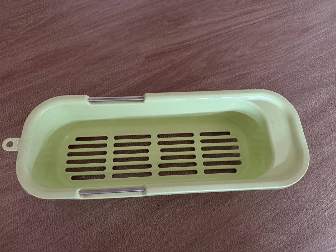 Rectangular Basket (Category: Storage Boxes & Baskets) located in Singapore. Submitted by ly_lo (Listing ID 1439627208, Image 2). Description: - Green rectangular basket - Features a handle - Made of plastic with a metal handle - Slotted base for drainage.