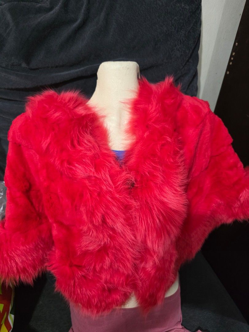 Red Faux Fur Shawl (Category: Coats, Jackets and Outerwear) located in Pasig City. Submitted by ecka.j (Listing ID 1439789158, Image 2). Description: Selling preloved fur shawl❄️ buyer will handle dry cleaning. - Luxurious red faux fur shawl - Soft and plush texture - Comfortable fit - Secure 2 clasp closure - Adds elegance and warmth - Great for special occasions or winter trips.