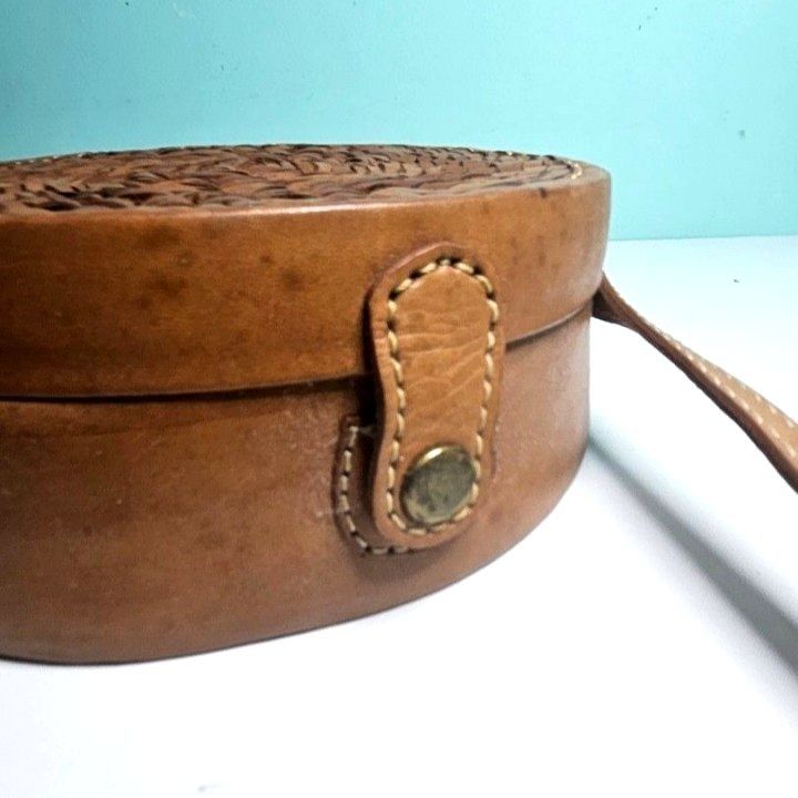Round Woven Crossbody Bag Bali (Category: Cross-body Bags) located in Imus. Submitted by mostlyvintage (Listing ID 1439788079, Image 3). Description: 🎀 round woven crossbody bag from Bali, Indonesia 🎀 🎀 adjustable strap🎀 🎀 flap closure 🎀 🎀 brown fabric lining 🎀 🎀 a portion of the lining has come off on one side of the bag; it needs to be glued 🎀 🌸 for fashion finds and other stuff, pls. visit my other store: https://carousell.app.link/