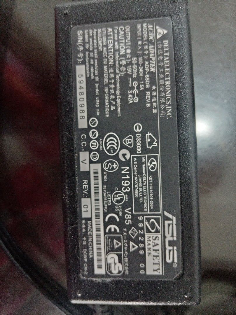 Price drop! ASUS Computer Battery Charger (Category: Cables & Adaptors) located in Makati City. Submitted by giovandbertha1 (Listing ID 1439619159, Image 2). Description: - Used for 2 months only. I found my other charger. - Bought at MCS. - ASUS ADP-65DB B AC Adapter - Input: 100-240V ~ 1.5A 50-60Hz - Output: 19V 3.42A - Includes power cord - Features a black, rectangular design - ASUS logo present - Manufactured by Delta Electronics Inc..