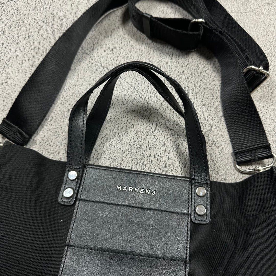 RUSH SALE! Authentic Marhen.J Kai Bag (Category: Shoulder Bags) located in Makati City. Submitted by goodvictory (Listing ID 1439745825, Image 2). Description: Marhen.J Kai Bag in black with a canvas and leather design.