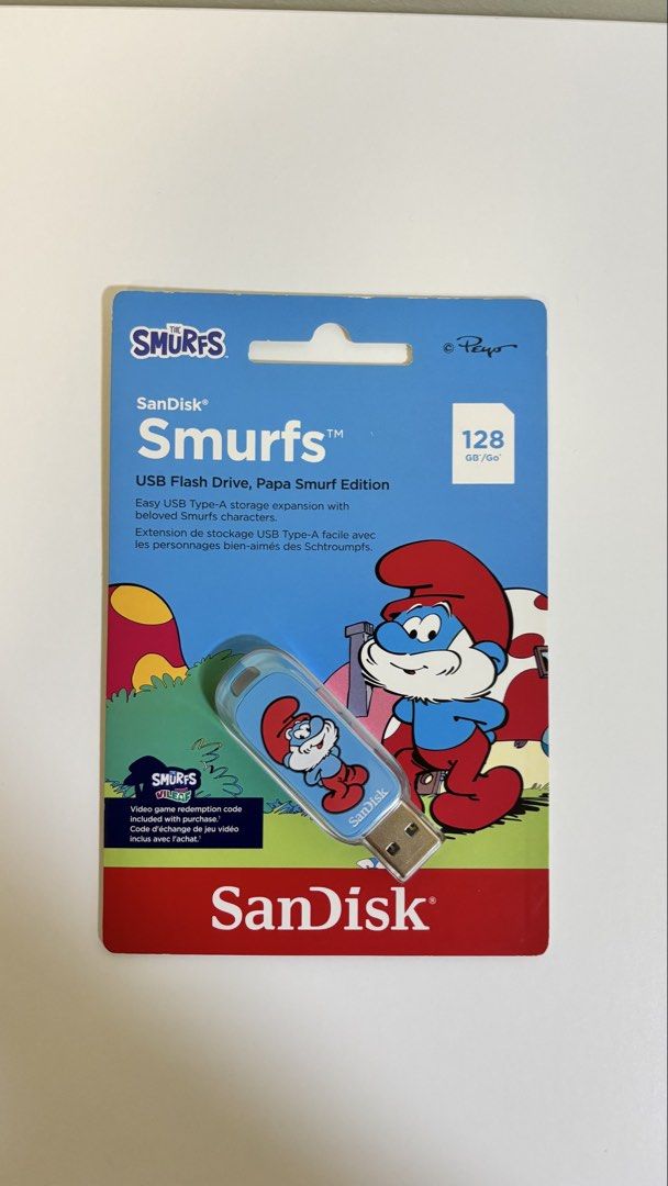 SanDisk Smurfs USB Flash Drive (Category: Hard Disks & Thumbdrives) located in Marikina City. Submitted by majojojojoe (Listing ID 1439745954, Image 1). Description: - SanDisk USB Flash Drive with Papa Smurf and Brainy Smurf design - 64GB and 128GB storage capacity - USB Type-A connection - Includes a video game redemption code - Great for storing and transferring files.