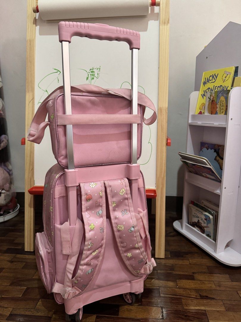 Sanrio school bag and lunch box (Category: Babies & Kids Fashion) located in Quezon City. Submitted by mdrpang (Listing ID 1439615346, Image 2). Description: Still in good condition Working zippers and stroller puller Only flaw: a portion of the corner outside pocket outline peeled off but doesnt affect the functionality of the bag Orig price: 4,200 php.